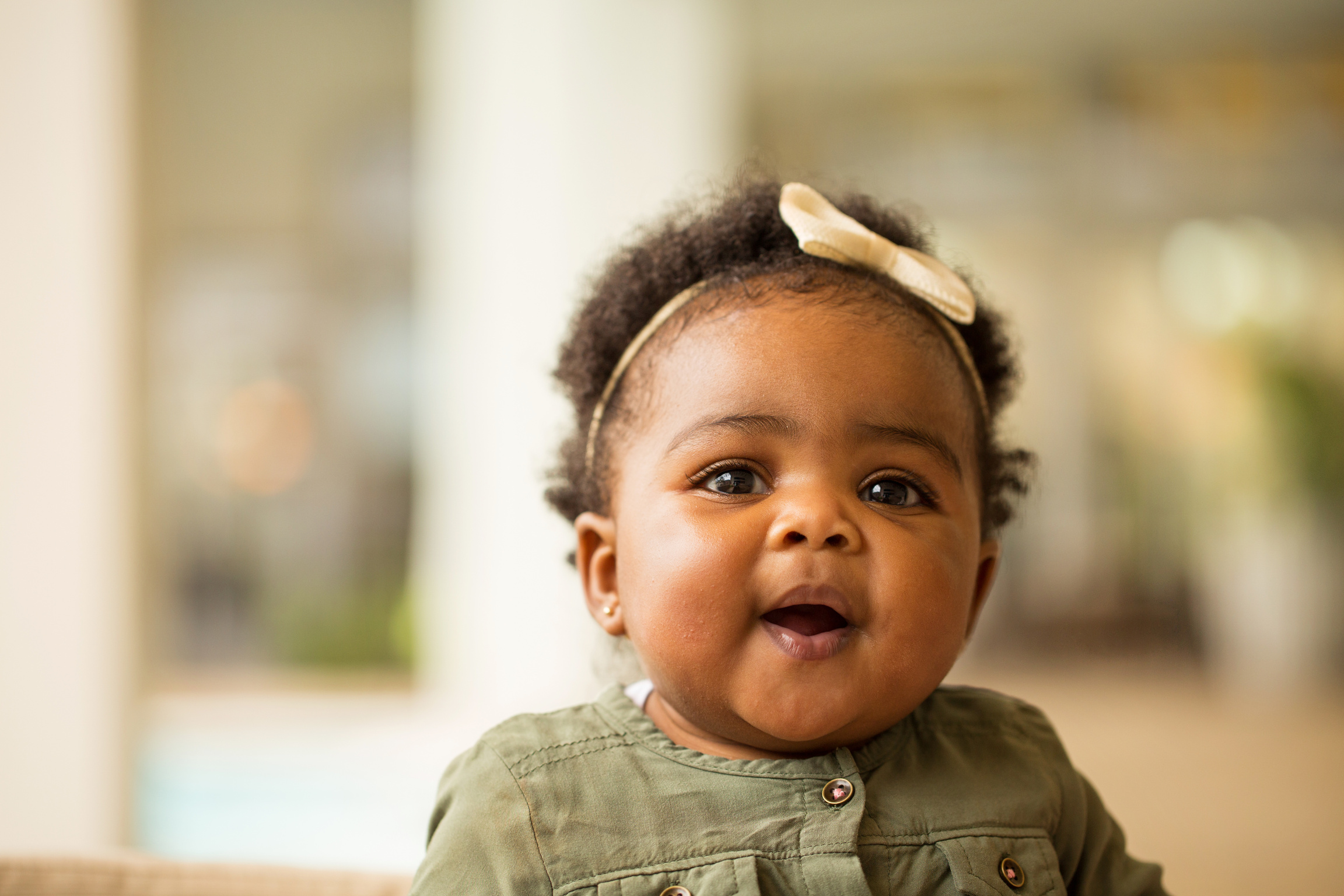Portrait of a Happy Little Girl Laughing and Smiling